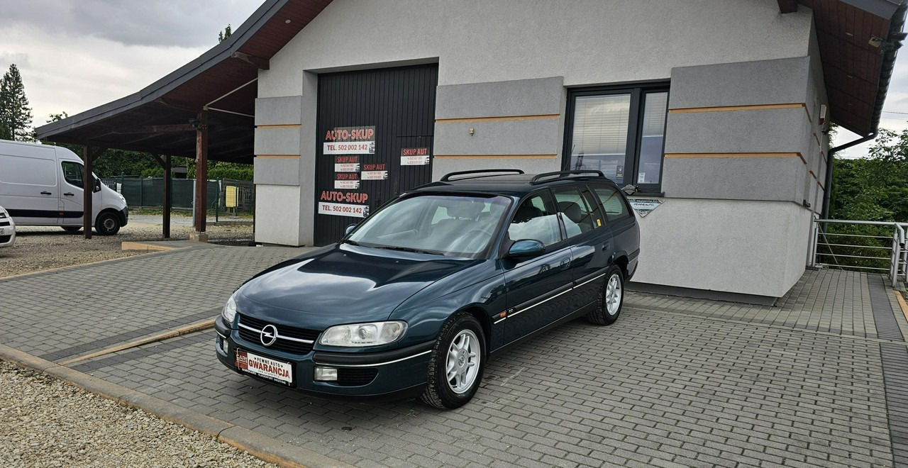 Opel Omega B 2,5 v6 *automat* napęd tył *welury* - Voiture break: photos 3 Opel Omega B 2,5 v6 *automat* napęd tył *welury* - Voiture break: photos 3