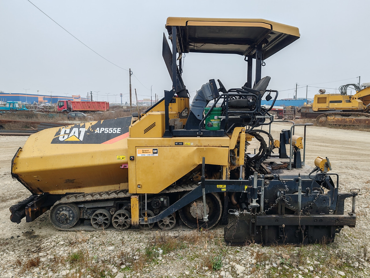 Caterpillar AP555E - Répandeuse: photos 4 Caterpillar AP555E - Répandeuse: photos 4