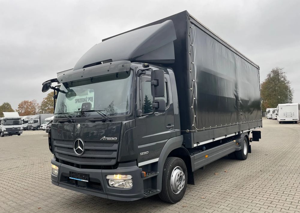 Mercedes-Benz ATEGO 1230 - Camion à rideaux coulissants: photos 1 Mercedes-Benz ATEGO 1230 - Camion à rideaux coulissants: photos 1