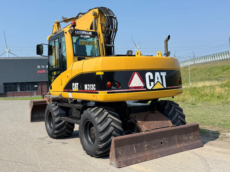 Caterpillar M313C - Pelle sur pneus: photos 4 Caterpillar M313C - Pelle sur pneus: photos 4