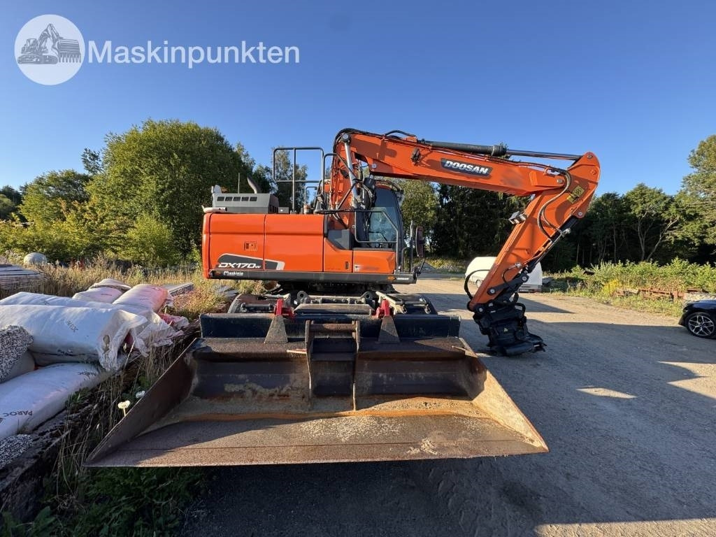 Doosan DX 170 W-5 + Tippvagn + Redskap - Pelle sur pneus: photos 4 Doosan DX 170 W-5 + Tippvagn + Redskap - Pelle sur pneus: photos 4