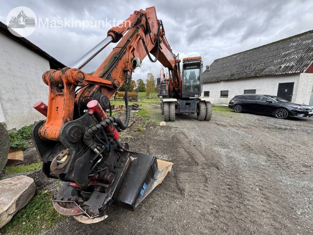 Hitachi ZX 140 W-3 - Pelle sur pneus: photos 5 Hitachi ZX 140 W-3 - Pelle sur pneus: photos 5