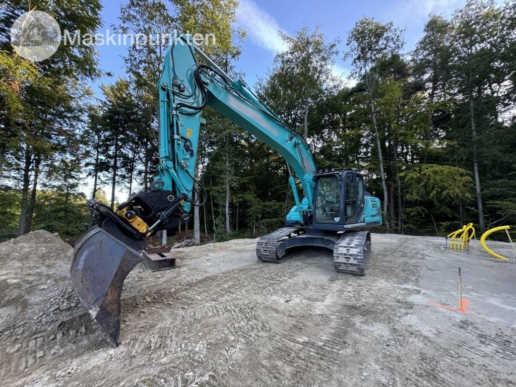 Kobelco SK 210 LC-10 - Pelle sur chenille: photos 1 Kobelco SK 210 LC-10 - Pelle sur chenille: photos 1