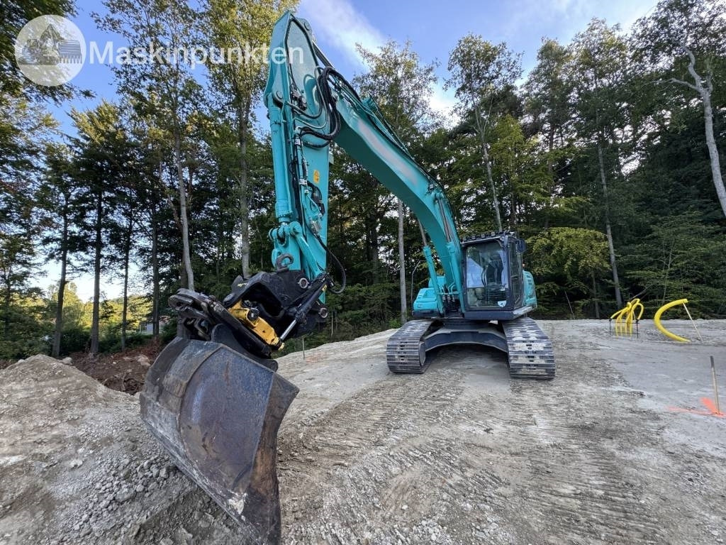 Kobelco SK 210 LC-10 - Pelle sur chenille: photos 5 Kobelco SK 210 LC-10 - Pelle sur chenille: photos 5