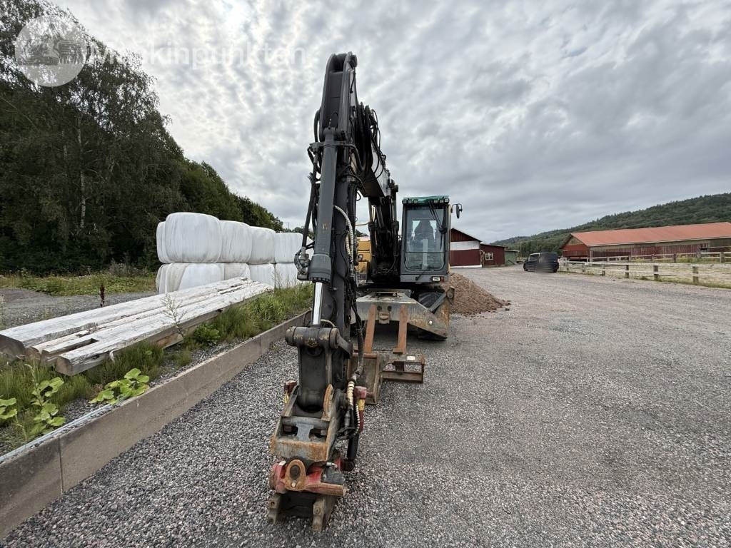Volvo EW 140 C - Pelle sur pneus: photos 2 Volvo EW 140 C - Pelle sur pneus: photos 2