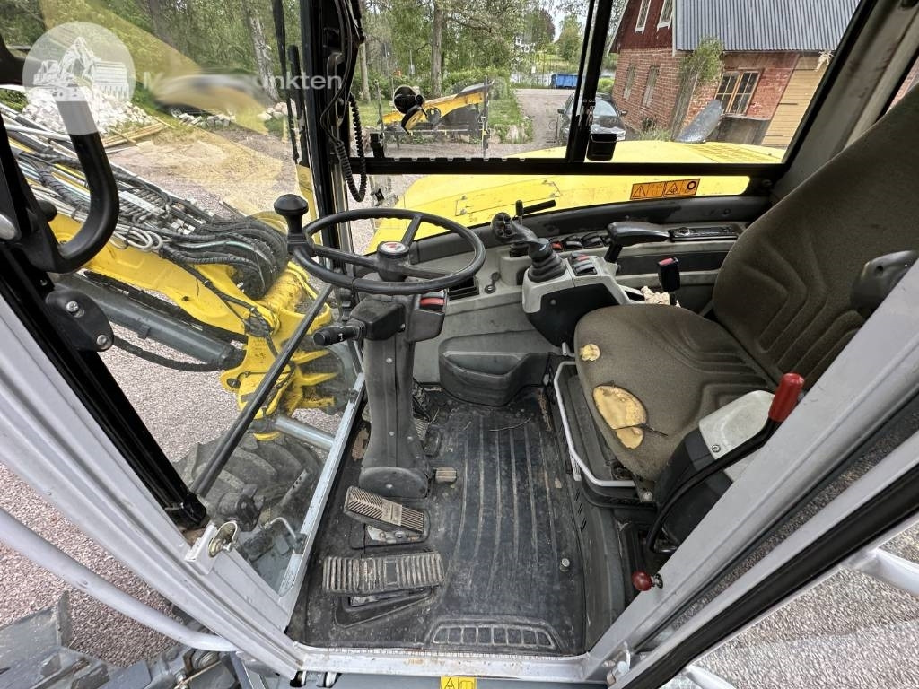 Pelle sur pneus Wacker Neuson 9503: photos 6