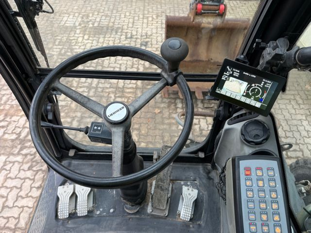 Pelle sur pneus Liebherr A914 Compact / 2017 BJ / 9.979 H / OilQuick: photos 13