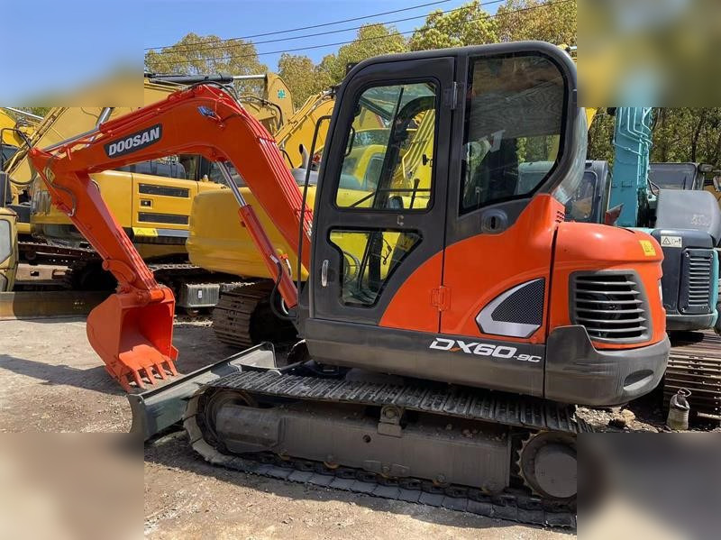 DOOSAN DX60E-9C - Mini pelle: photos 1 DOOSAN DX60E-9C - Mini pelle: photos 1