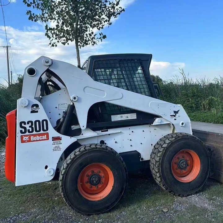 Used Bob Cat Bob Cat S300 Used Mini Skid Steer Wheel Loader Multifunctional Track Loaders Bobcat S300 - Mini chargeuse: photos 2 Used Bob Cat Bob Cat S300 Used Mini Skid Steer Wheel Loader Multifunctional Track Loaders Bobcat S300 - Mini chargeuse: photos 2