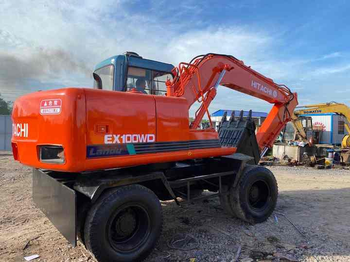 Used Hitachi Ex100WD Wheel Excavator for Sale Japan Made Hitachi Ex100wd Wheeled Excavator for Sale - Pelle sur pneus: photos 4 Used Hitachi Ex100WD Wheel Excavator for Sale Japan Made Hitachi Ex100wd Wheeled Excavator for Sale - Pelle sur pneus: photos 4