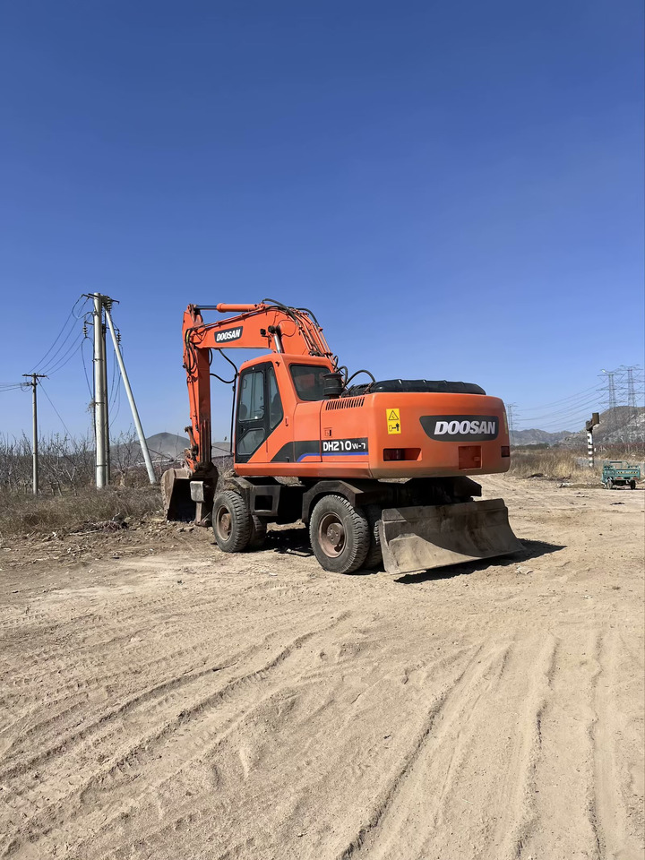 DOOSAN DH210W-7 - Pelle sur pneus: photos 5 DOOSAN DH210W-7 - Pelle sur pneus: photos 5