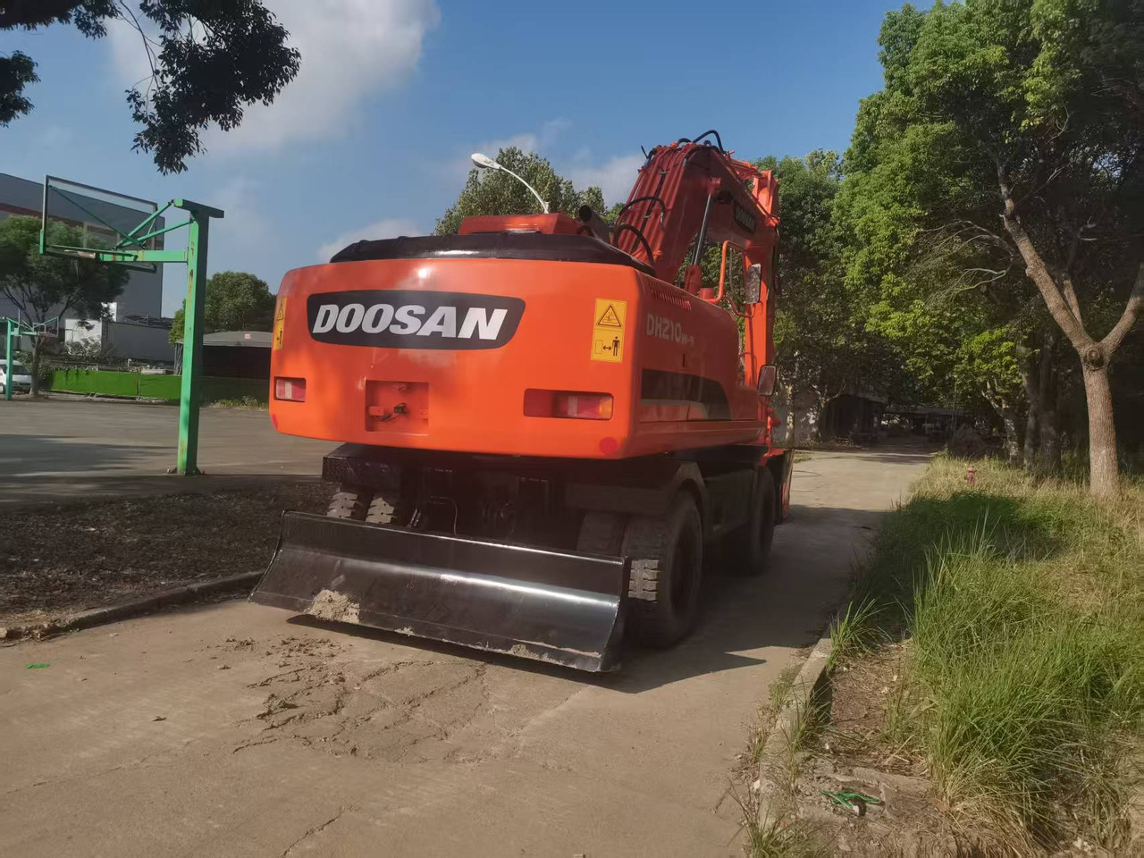 DOOSAN DH210W-9C - Pelle sur pneus: photos 4 DOOSAN DH210W-9C - Pelle sur pneus: photos 4
