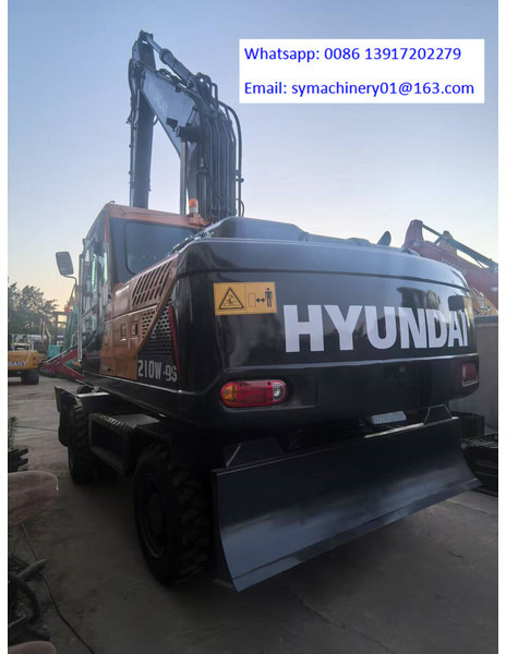Hyundai R210W-9S - Pelle sur pneus: photos 1 Hyundai R210W-9S - Pelle sur pneus: photos 1