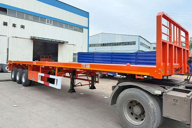 TITAN 40Ft Flatbed Trailer for Sale Price in Jamaica - Semi-remorque plateau: photos 1 TITAN 40Ft Flatbed Trailer for Sale Price in Jamaica - Semi-remorque plateau: photos 1