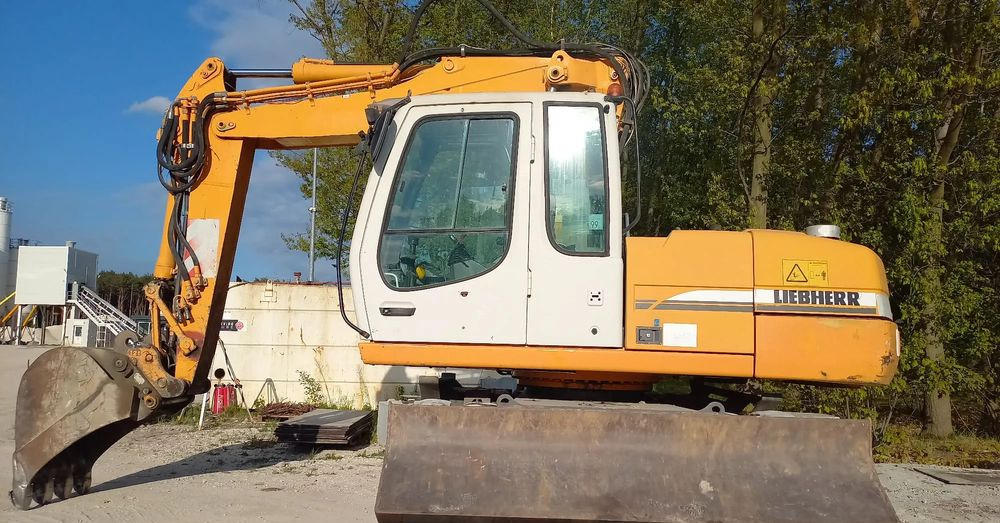 Liebherr A316 - Pelle sur pneus: photos 1 Liebherr A316 - Pelle sur pneus: photos 1
