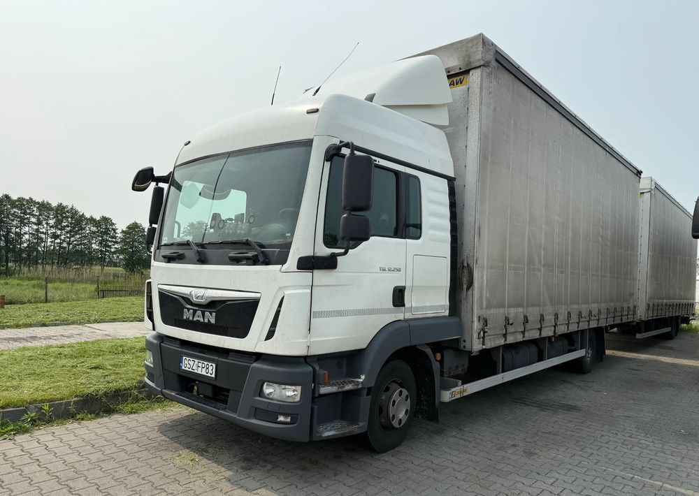MAN - Camion à rideaux coulissants: photos 3 MAN - Camion à rideaux coulissants: photos 3