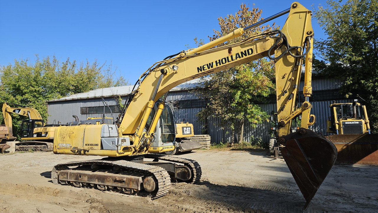 NEW HOLLAND E 245 B - Pelle sur chenille: photos 4 NEW HOLLAND E 245 B - Pelle sur chenille: photos 4