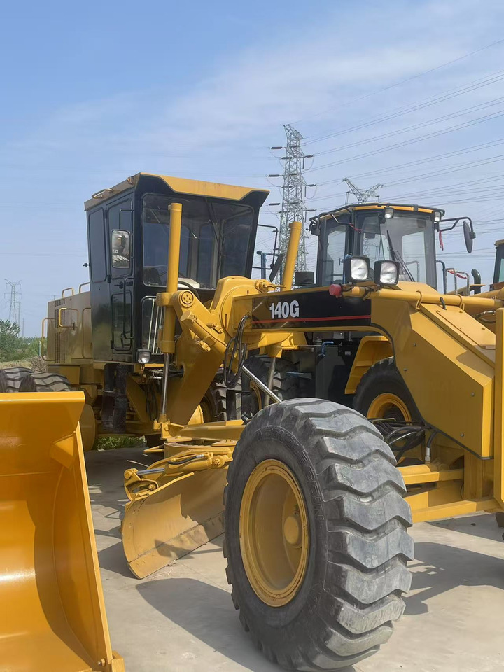 CATERPILLAR 140g used motor grader Source supply low price Road construction equipment - Niveleuse: photos 1 CATERPILLAR 140g used motor grader Source supply low price Road construction equipment - Niveleuse: photos 1