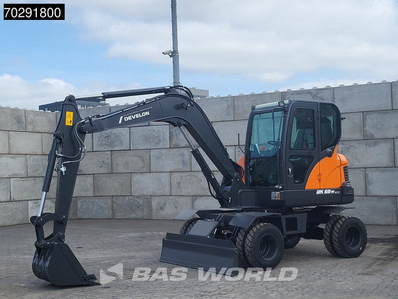 Develon DX60 WN ECO-1 A/C - Pelle sur pneus: photos 2 Develon DX60 WN ECO-1 A/C - Pelle sur pneus: photos 2