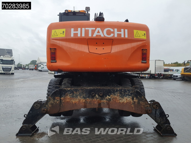 Hitachi ZX140W -3 OUTRIGGERS - ROTOTILT - Pelle sur pneus: photos 3 Hitachi ZX140W -3 OUTRIGGERS - ROTOTILT - Pelle sur pneus: photos 3