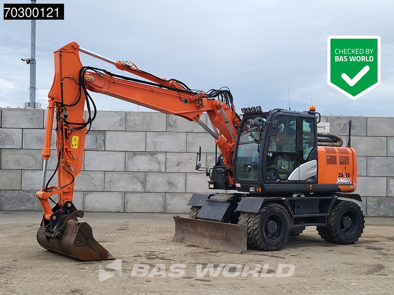 Hitachi ZX140W -6 - Pelle sur pneus: photos 1 Hitachi ZX140W -6 - Pelle sur pneus: photos 1