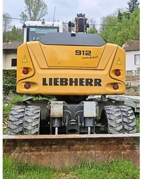 Liebherr A912 COMPACT - Pelle sur pneus: photos 4 Liebherr A912 COMPACT - Pelle sur pneus: photos 4