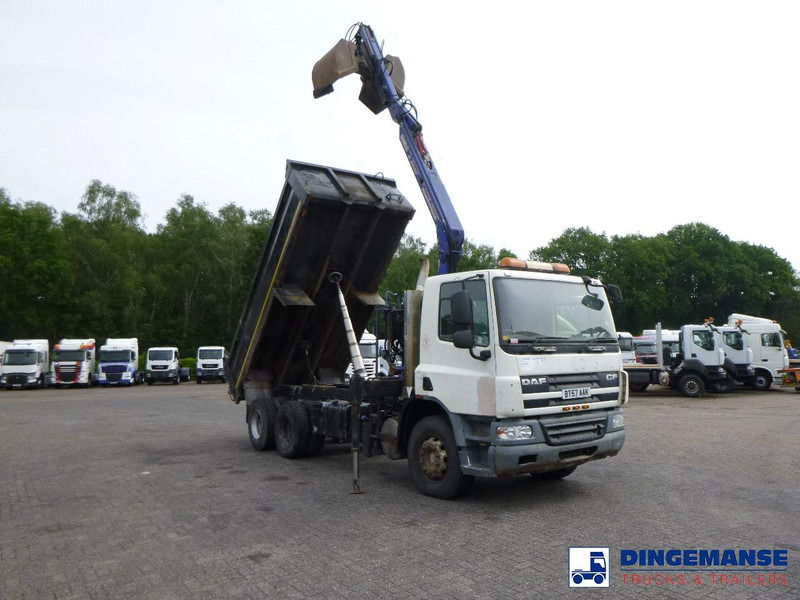 DAF CF 75.310 6x4 RHD tipper + HMF 1144 K-1 + grapple - Camion grue: photos 2 DAF CF 75.310 6x4 RHD tipper + HMF 1144 K-1 + grapple - Camion grue: photos 2