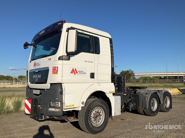 2009 MAN TGX33.540 6x4 Heavy Haul T/A Sleeper Truck Tractor - Tracteur routier: photos 1 2009 MAN TGX33.540 6x4 Heavy Haul T/A Sleeper Truck Tractor - Tracteur routier: photos 1