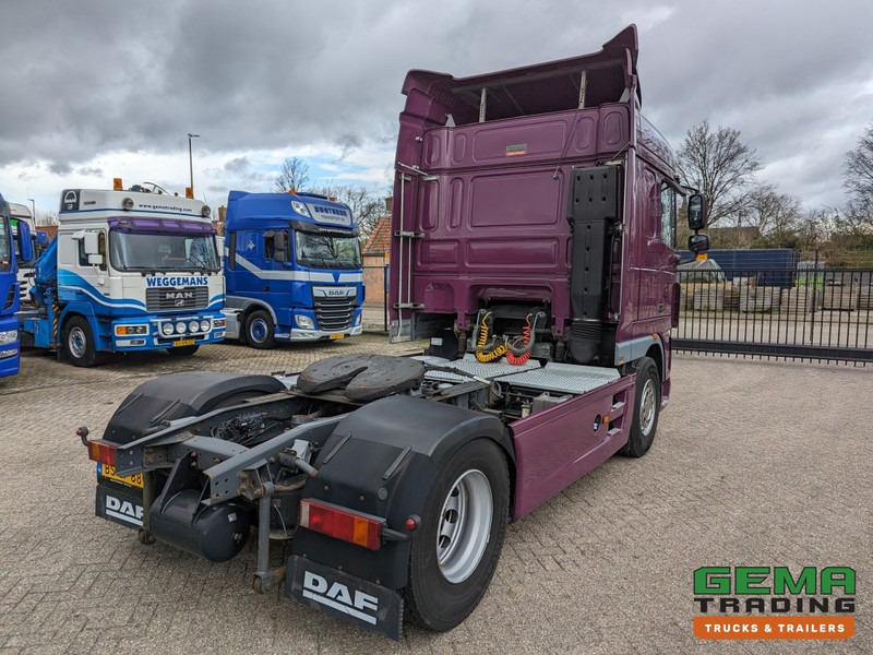 DAF FT XF105.410 4x2 Euro5 FT XF105.410 4x2 SpaceCab Euro5 - Side Skirts - Spare Wheel - Original Holland truck (T1333) - Tracteur routier: photos 3 DAF FT XF105.410 4x2 Euro5 FT XF105.410 4x2 SpaceCab Euro5 - Side Skirts - Spare Wheel - Original Holland truck (T1333) - Tracteur routier: photos 3