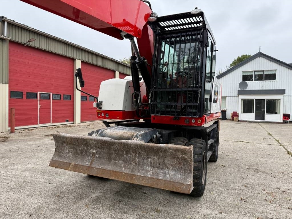 CAT M320F  - Pelle sur pneus: photos 4 CAT M320F  - Pelle sur pneus: photos 4