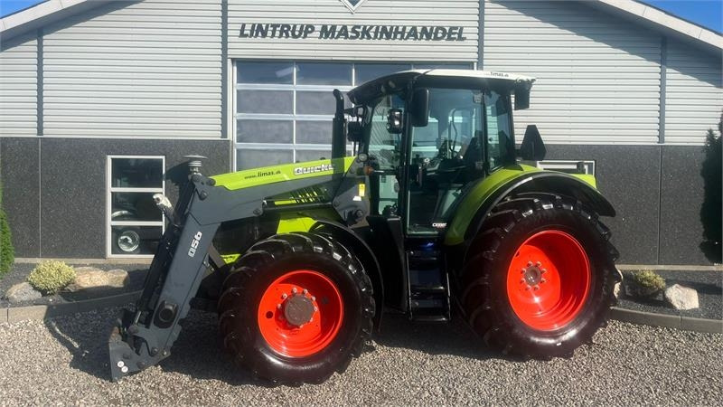 Claas ARION 550 CEBIS Med frontlæsser og frontlift - Tracteur agricole: photos 1 Claas ARION 550 CEBIS Med frontlæsser og frontlift - Tracteur agricole: photos 1