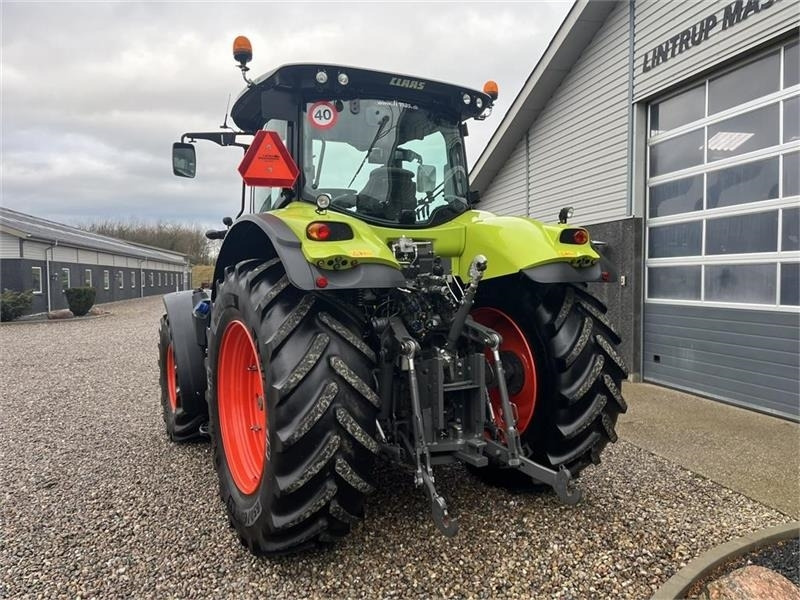 Tracteur agricole Claas Axion 830 med frontlift og front PTO: photos 10 Tracteur agricole Claas Axion 830 med frontlift og front PTO: photos 10