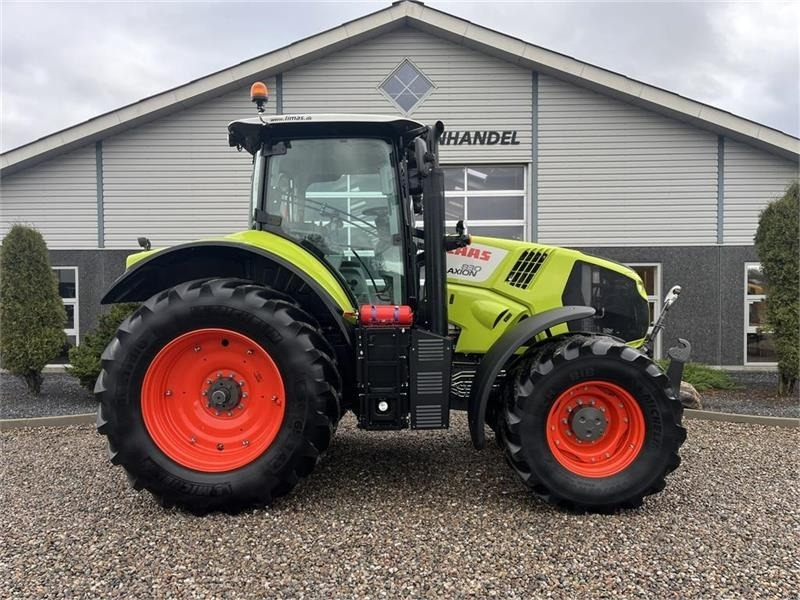 Tracteur agricole Claas Axion 830 med frontlift og front PTO: photos 12 Tracteur agricole Claas Axion 830 med frontlift og front PTO: photos 12