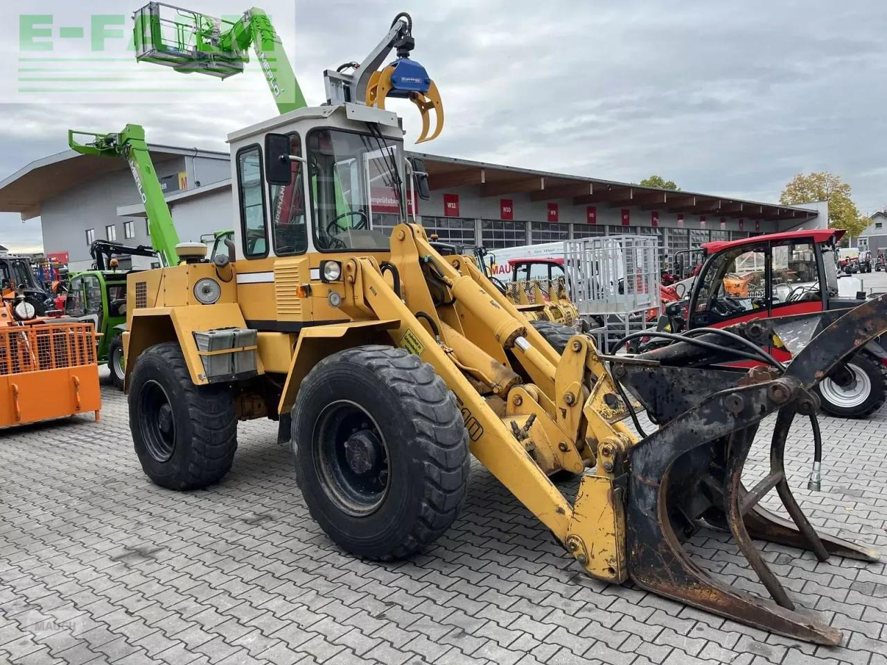 Liebherr l510 mit 2x schaufel, staplergabel, poltergabel - Mini pelle: photos 1 Liebherr l510 mit 2x schaufel, staplergabel, poltergabel - Mini pelle: photos 1