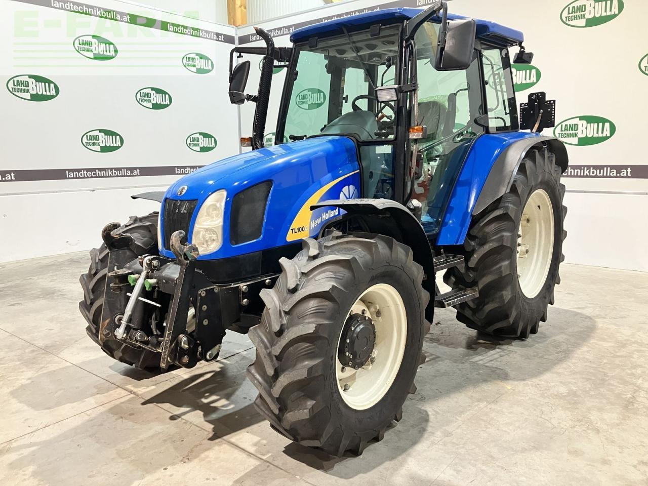 New Holland tl100a (4wd) A - Tracteur agricole: photos 1 New Holland tl100a (4wd) A - Tracteur agricole: photos 1