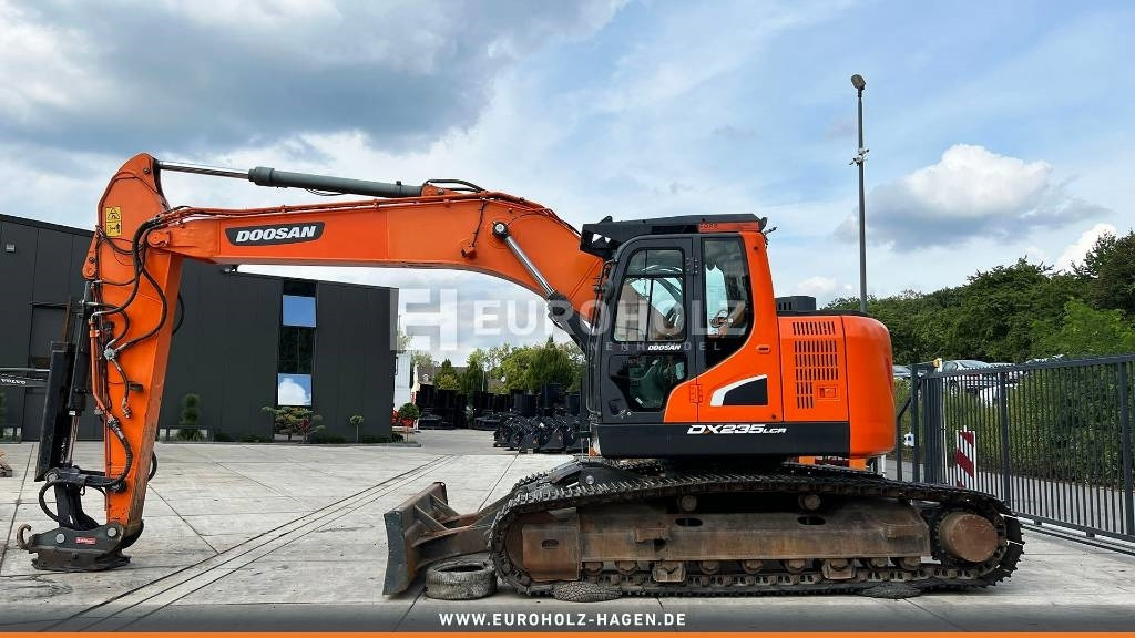 Doosan Kettenbagger DX 235 LCR-5, hyd. SW OilQuick 70-55 - Pelle sur chenille: photos 3 Doosan Kettenbagger DX 235 LCR-5, hyd. SW OilQuick 70-55 - Pelle sur chenille: photos 3