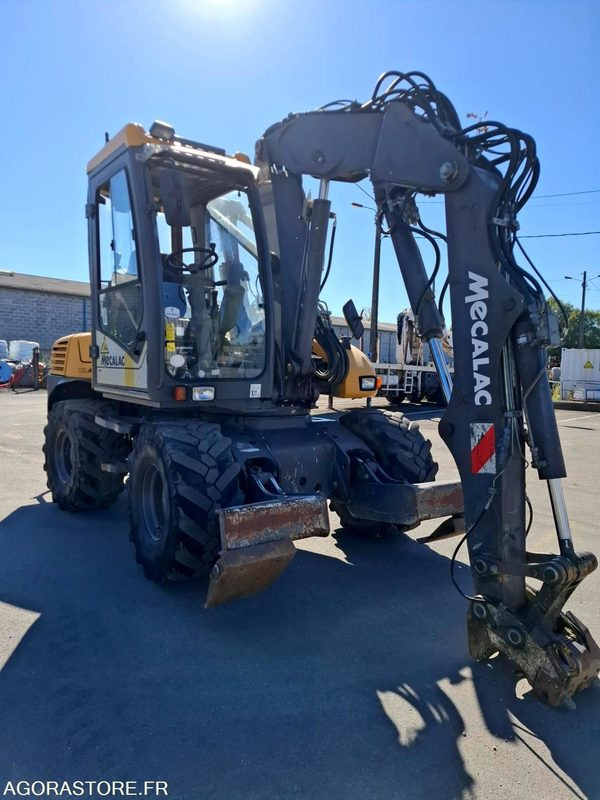 Pelle sur pneus MECALAC 12MTX - N° série 42770 - 2014 - 11400 heures - Pelle: photos 5 Pelle sur pneus MECALAC 12MTX - N° série 42770 - 2014 - 11400 heures - Pelle: photos 5