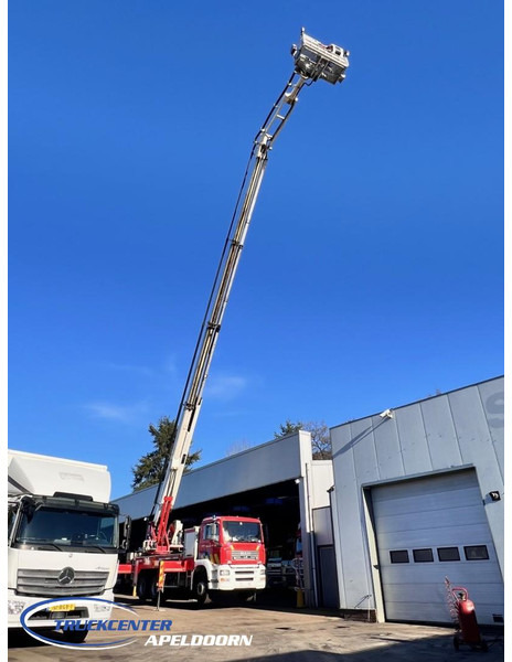 MAN TGA 26.350 Magirus ALP 320L = 32 meter, Waterpump, 6x4, Steel springs - Camion: photos 1 MAN TGA 26.350 Magirus ALP 320L = 32 meter, Waterpump, 6x4, Steel springs - Camion: photos 1