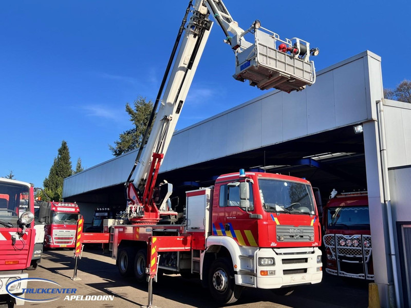 MAN TGA 26.350 Magirus ALP 320L = 32 meter, Waterpomp, 6x4, Bladgeveerd - Camion de pompier: photos 2 MAN TGA 26.350 Magirus ALP 320L = 32 meter, Waterpomp, 6x4, Bladgeveerd - Camion de pompier: photos 2