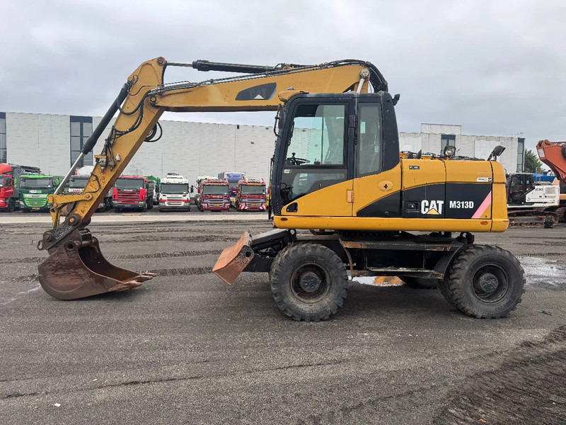Caterpillar M313D 7212 HOURS - Pelle sur pneus: photos 5 Caterpillar M313D 7212 HOURS - Pelle sur pneus: photos 5