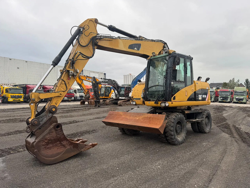 Caterpillar M313D 7212 HOURS - Pelle sur pneus: photos 4 Caterpillar M313D 7212 HOURS - Pelle sur pneus: photos 4
