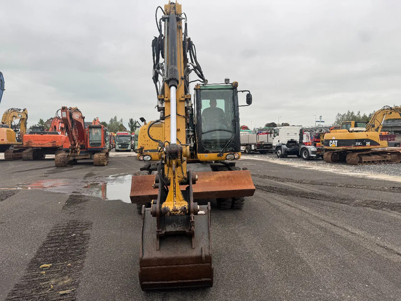 Caterpillar M313D 7212 HOURS - Pelle sur pneus: photos 2 Caterpillar M313D 7212 HOURS - Pelle sur pneus: photos 2