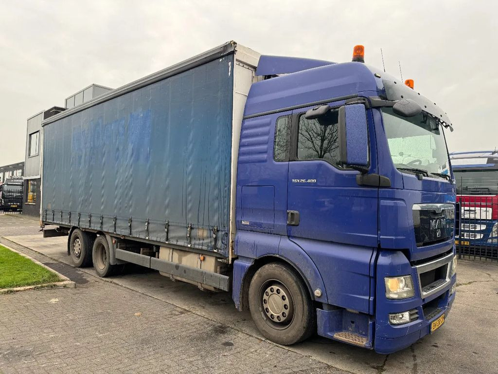 MAN TGX 26.400 6X2 - EURO 4 + LIFT + STEERING AXLE + - Camion à rideaux coulissants: photos 3 MAN TGX 26.400 6X2 - EURO 4 + LIFT + STEERING AXLE + - Camion à rideaux coulissants: photos 3