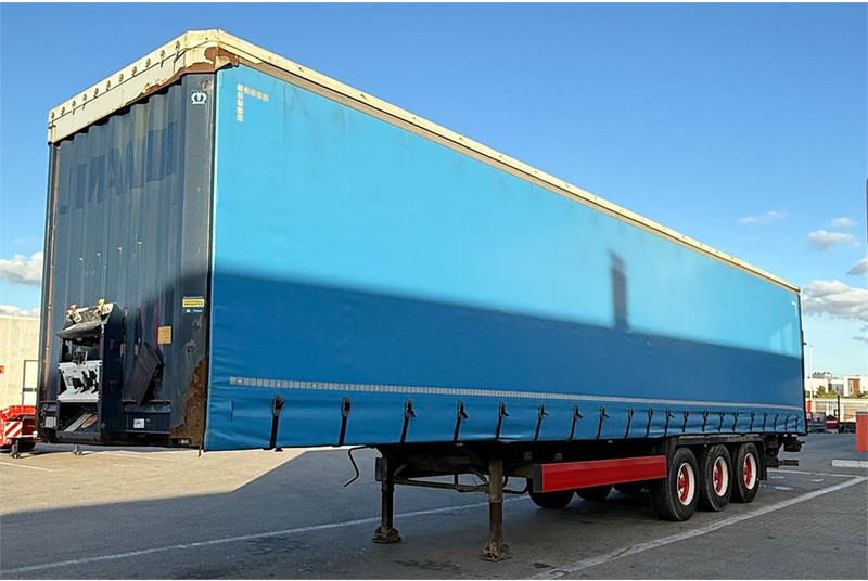 Krone 34 pl. - Semi-remorque rideaux coulissants: photos 1 Krone 34 pl. - Semi-remorque rideaux coulissants: photos 1