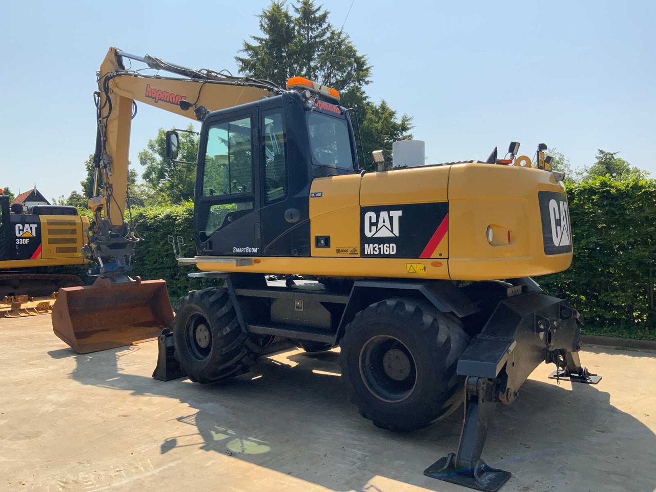 Caterpillar M316D - Pelle sur pneus: photos 5 Caterpillar M316D - Pelle sur pneus: photos 5