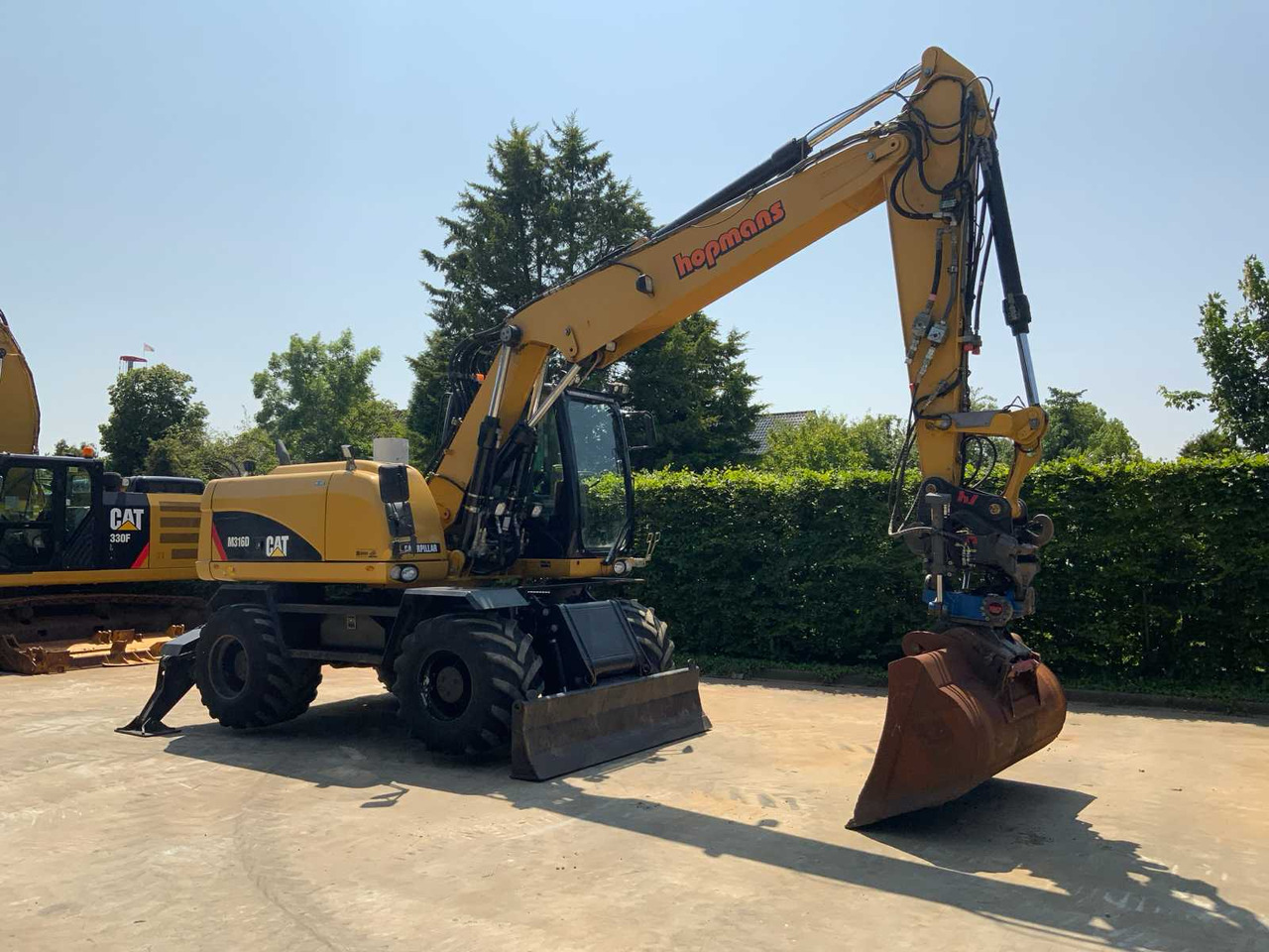 Caterpillar M316D - Pelle sur pneus: photos 2 Caterpillar M316D - Pelle sur pneus: photos 2