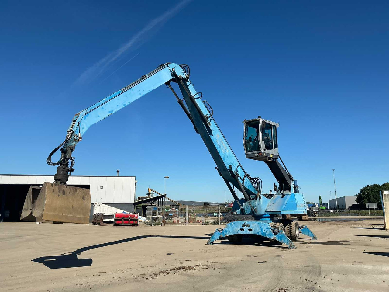 Terex-Fuchs MHL 340 - Pelle sur pneus: photos 1 Terex-Fuchs MHL 340 - Pelle sur pneus: photos 1