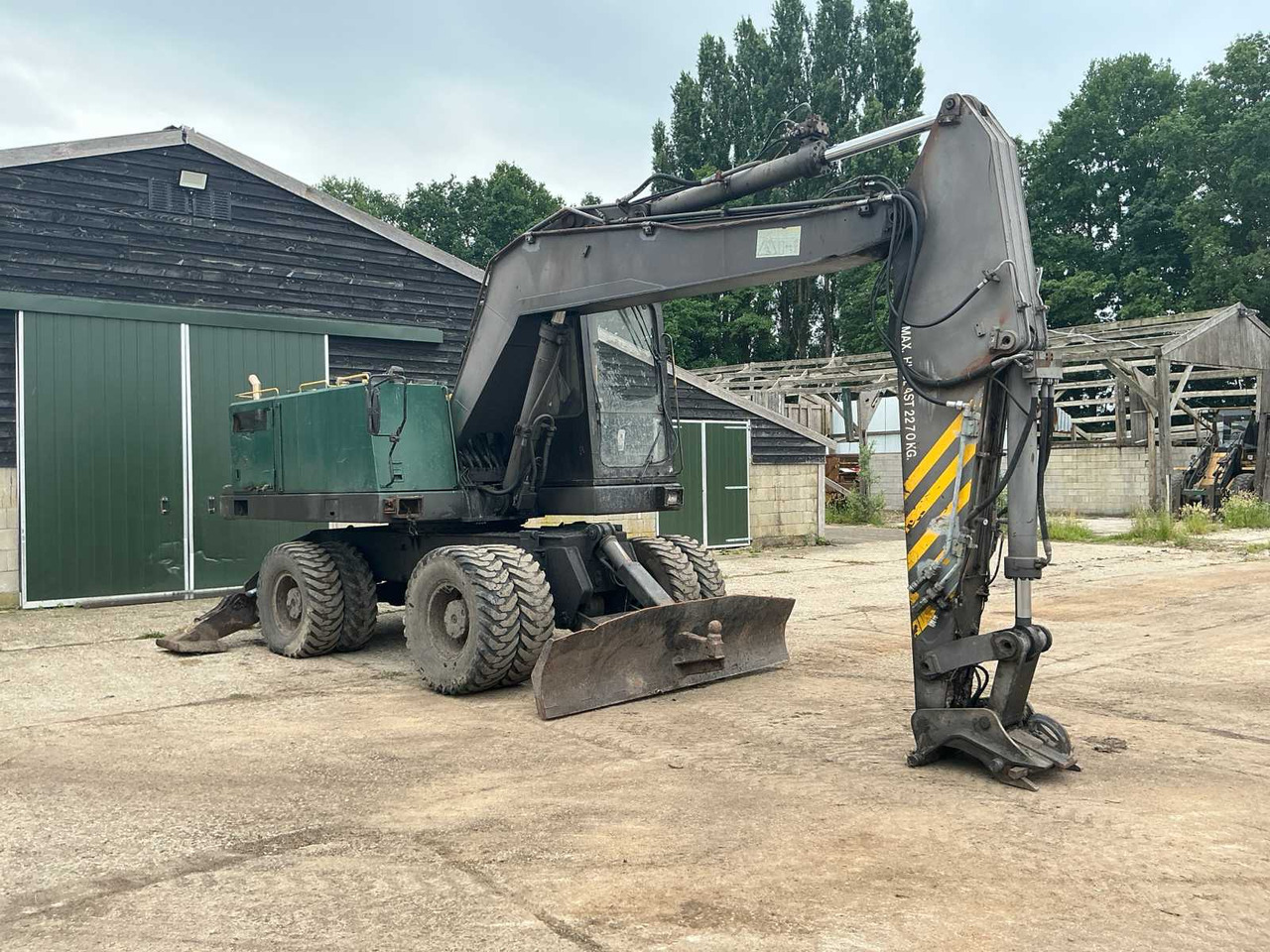 Volvo EW200 - Pelle sur pneus: photos 3 Volvo EW200 - Pelle sur pneus: photos 3