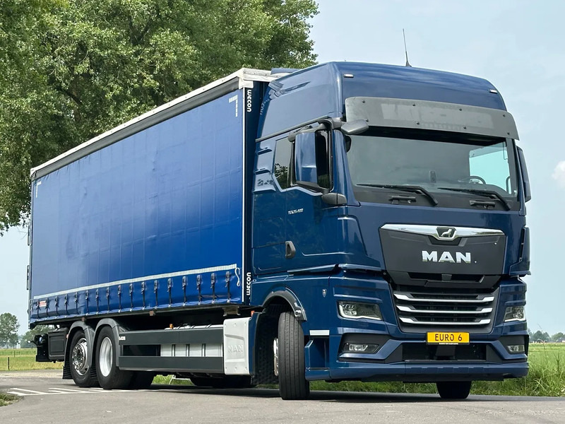 MAN 26.402 MAN TGX 26.400. EURO6. 2021. 910x249x270 - Camion à rideaux coulissants: photos 2 MAN 26.402 MAN TGX 26.400. EURO6. 2021. 910x249x270 - Camion à rideaux coulissants: photos 2