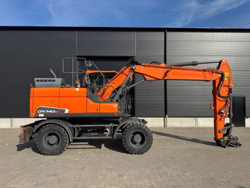 Pelle sur pneus Doosan DX140-5 2018: photos 7